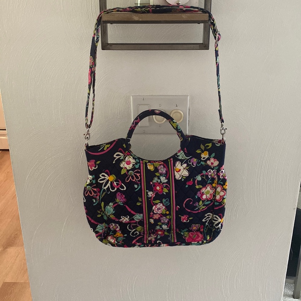 Vera Bradley magnetic top closure purse.